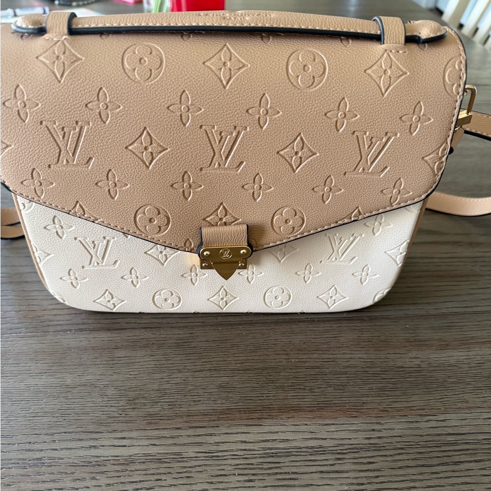 Gently used Tan and Cream Women's Bag
